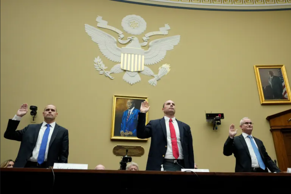 Ryan Graves, David Grusch, and Commander David Fravor being sworn in at the 2023 Congressional UAP hearing